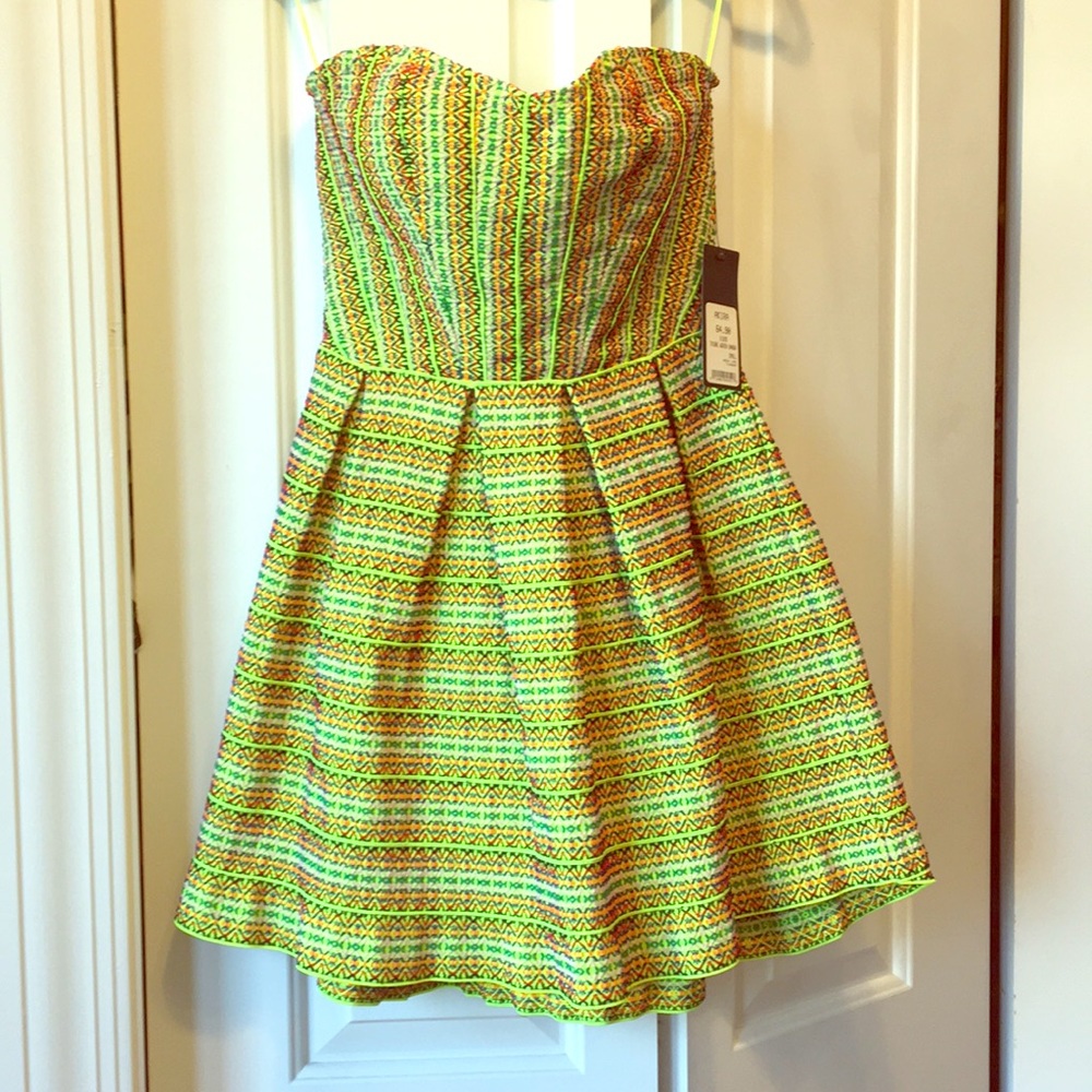 Akira Chicago neon lime tribal bandage dress.